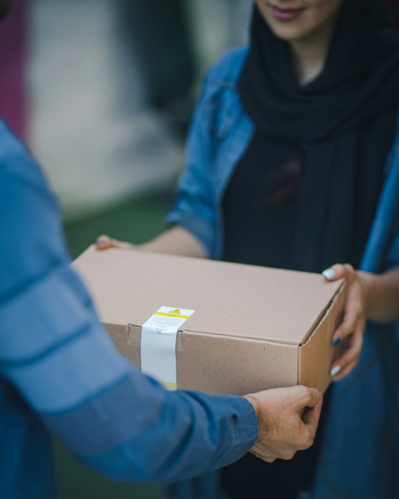 A package handed across a counter